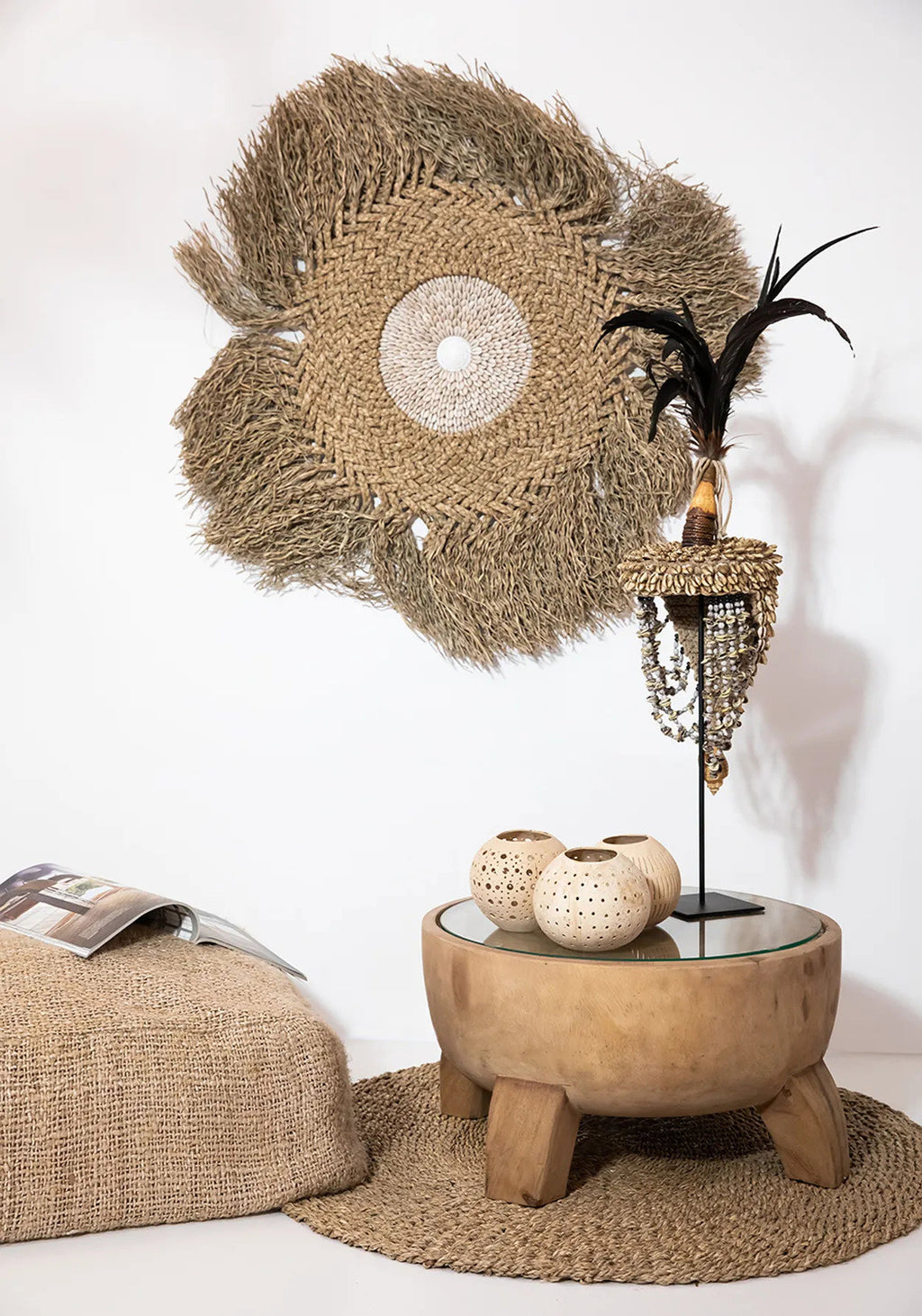 Round woven hand made rug on a white background
